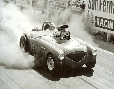 Illustration for article titled Whitewall Tires And Muffler Pipe Rollbars: Drag Racing Back In The Day
